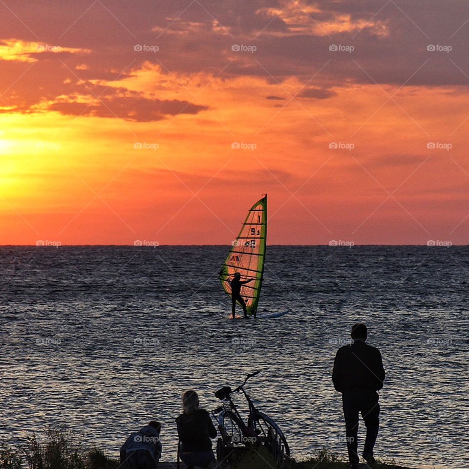 Watching windsurfer