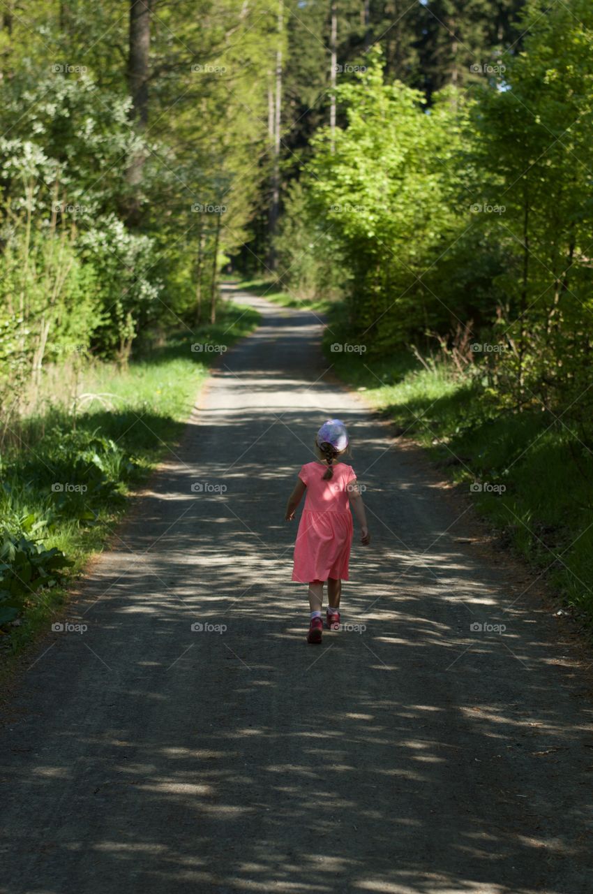 A Child walk through the Forest
