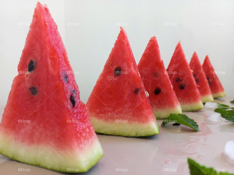 triangular slices of watermelon.