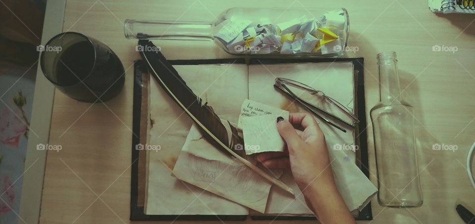 green light with bottle and a book