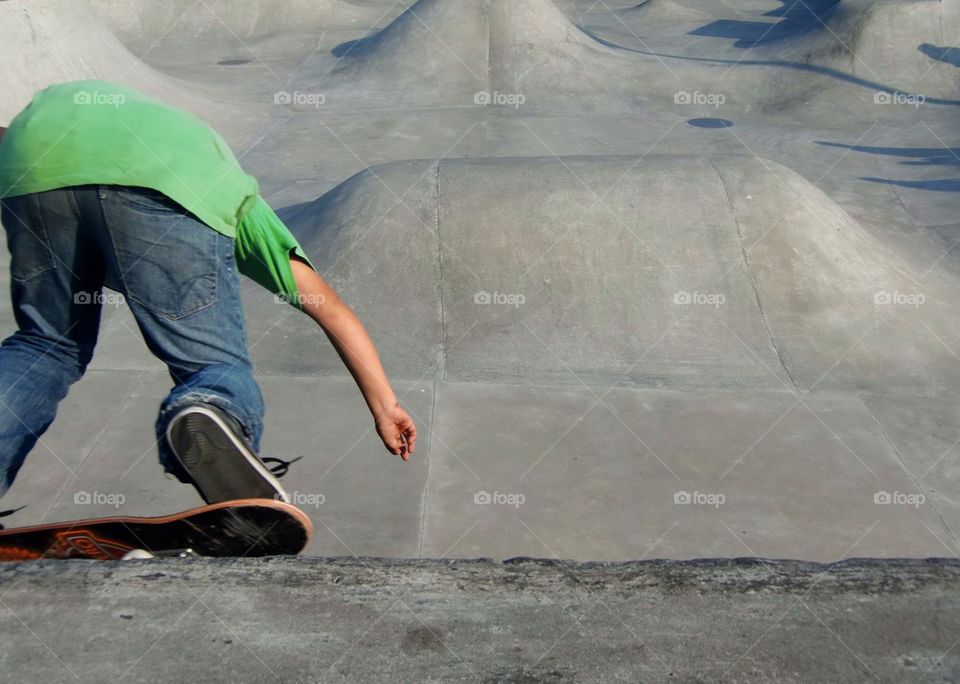 A person skating at skatepark