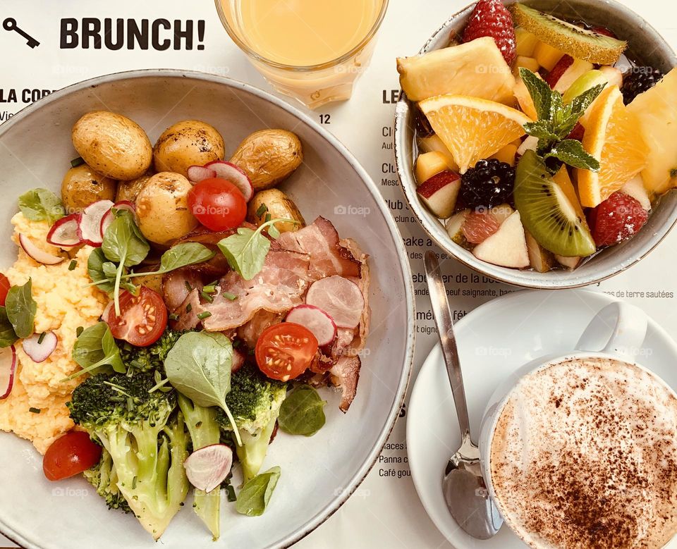 Salad, fruit salad and cappuccino from above, brunch composition from above, healthy light meal, Sunday brunch 