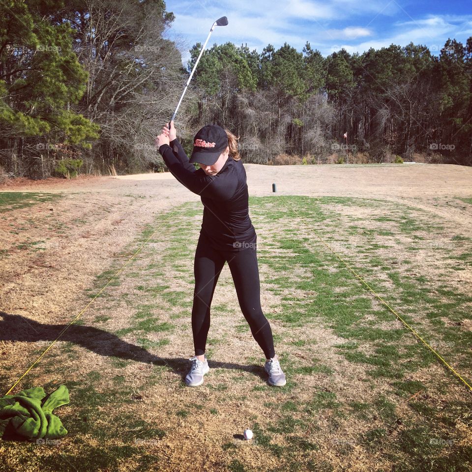 Golfing brunettes girl 