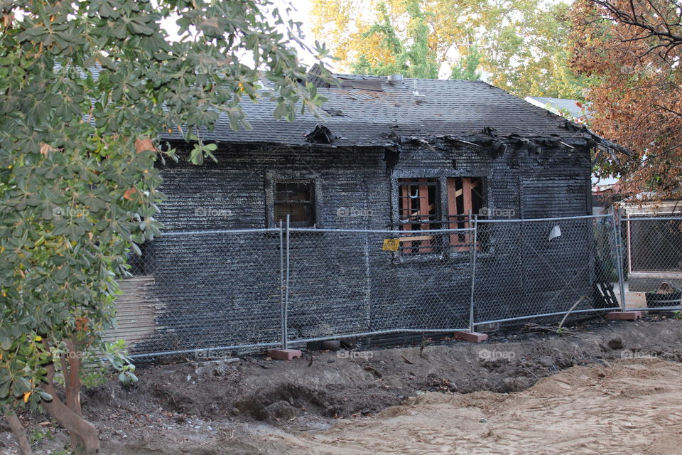 fire scorched house