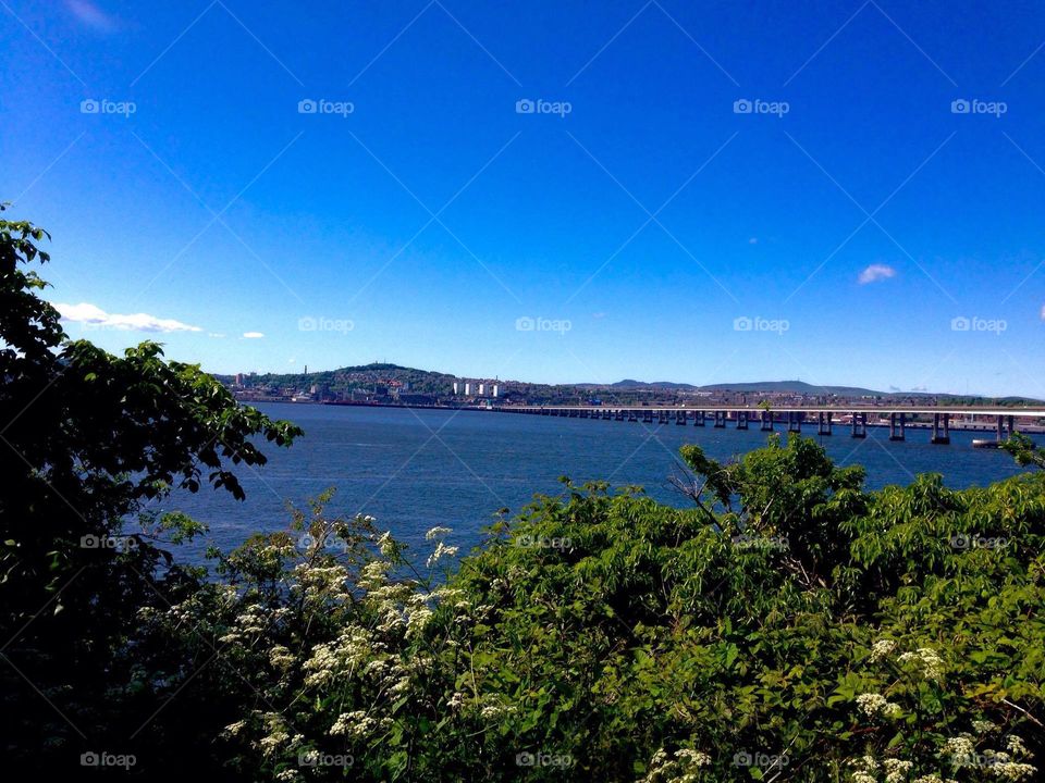 The Dundee Chronicles pt.4 Tayport view of Dundee. Frightening to think this is a city surrounding a dormant volcano ( Dundee Law - the tall mound in front-). Caught this on a stunning day, forgot water though..