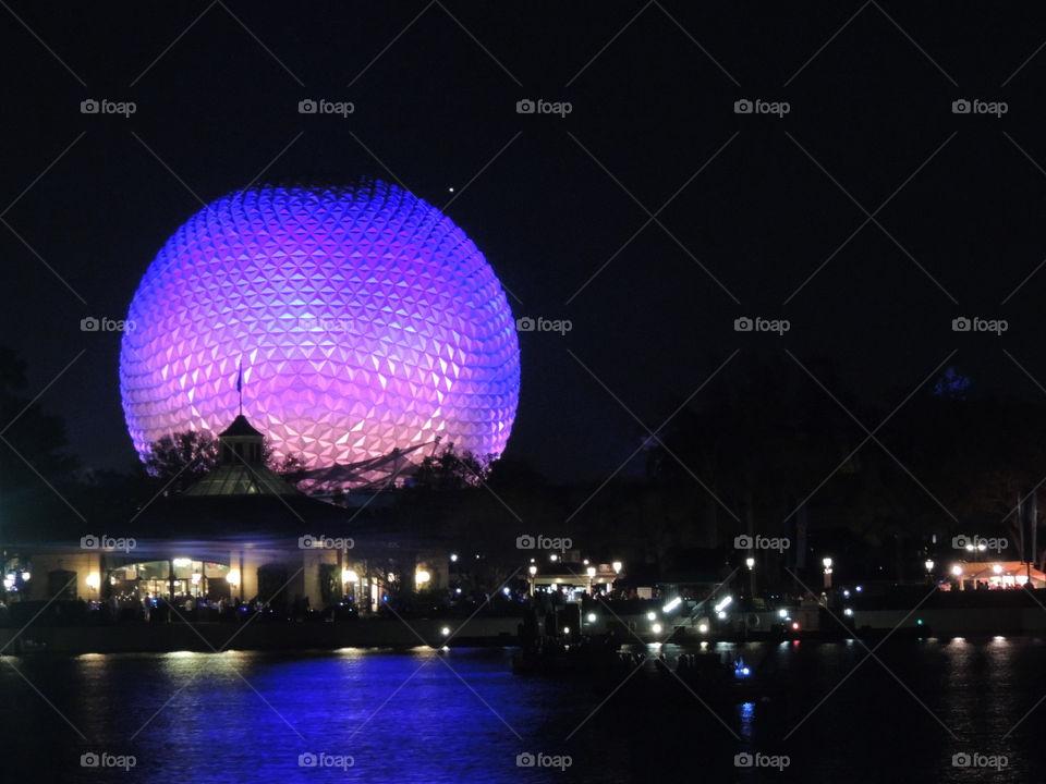 Spaceship Earth shines bright at the entrance to EPCOT at the Walt Disney World Resort in Orlando, Florida.