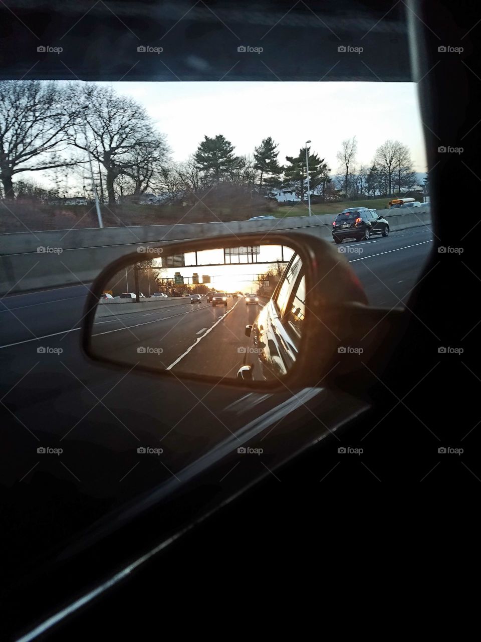 Highway from sideview mirror