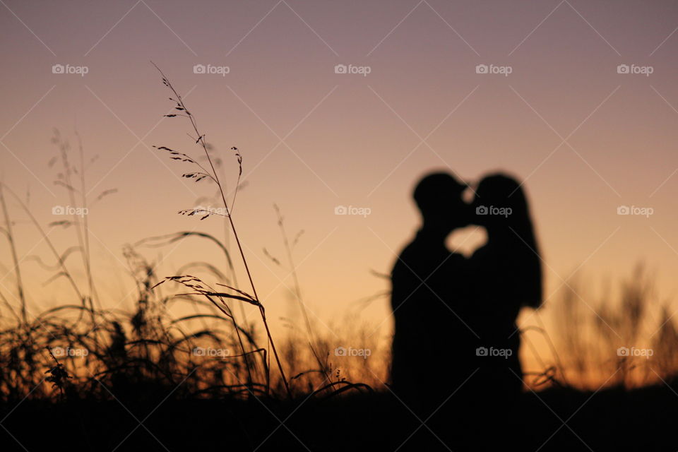 Silhouette of couple making love