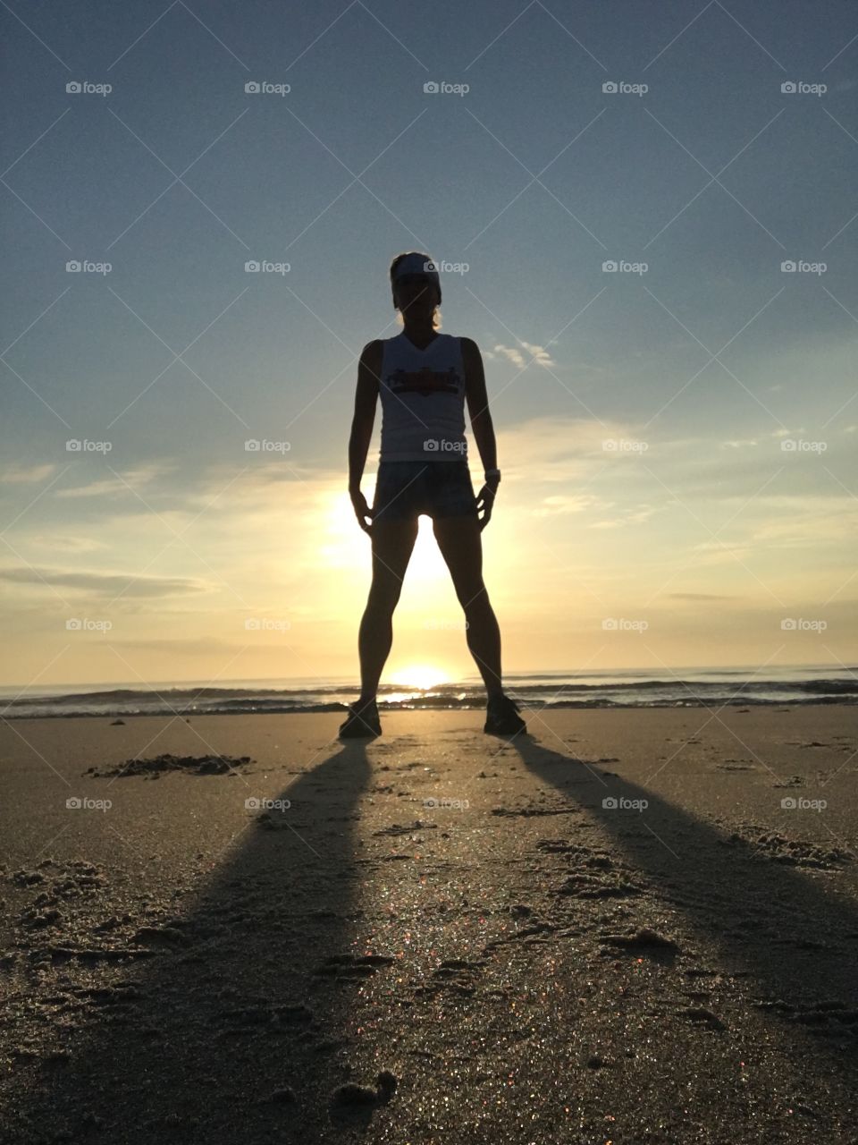 Back against the sun on beach