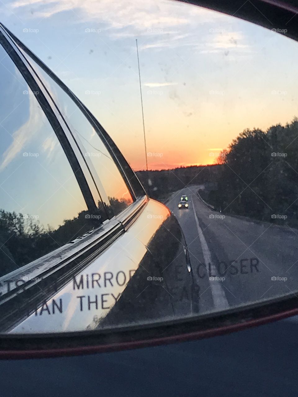 Here’s a beautiful reflection in my mirror of my window of the most gorgeous sunset ever! 