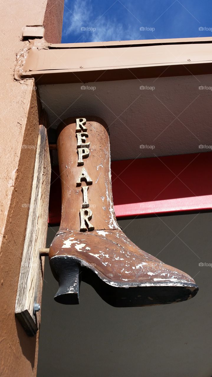 Sign at a shoe repair shop