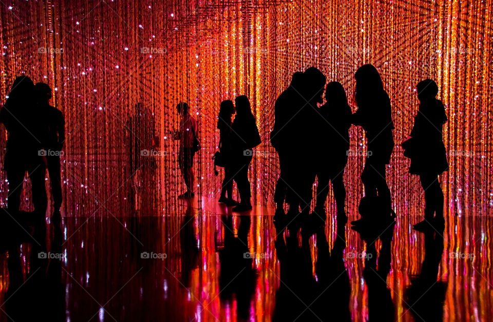 Silhouette of people and their shadow, inside the Art Science Museum, Singapore