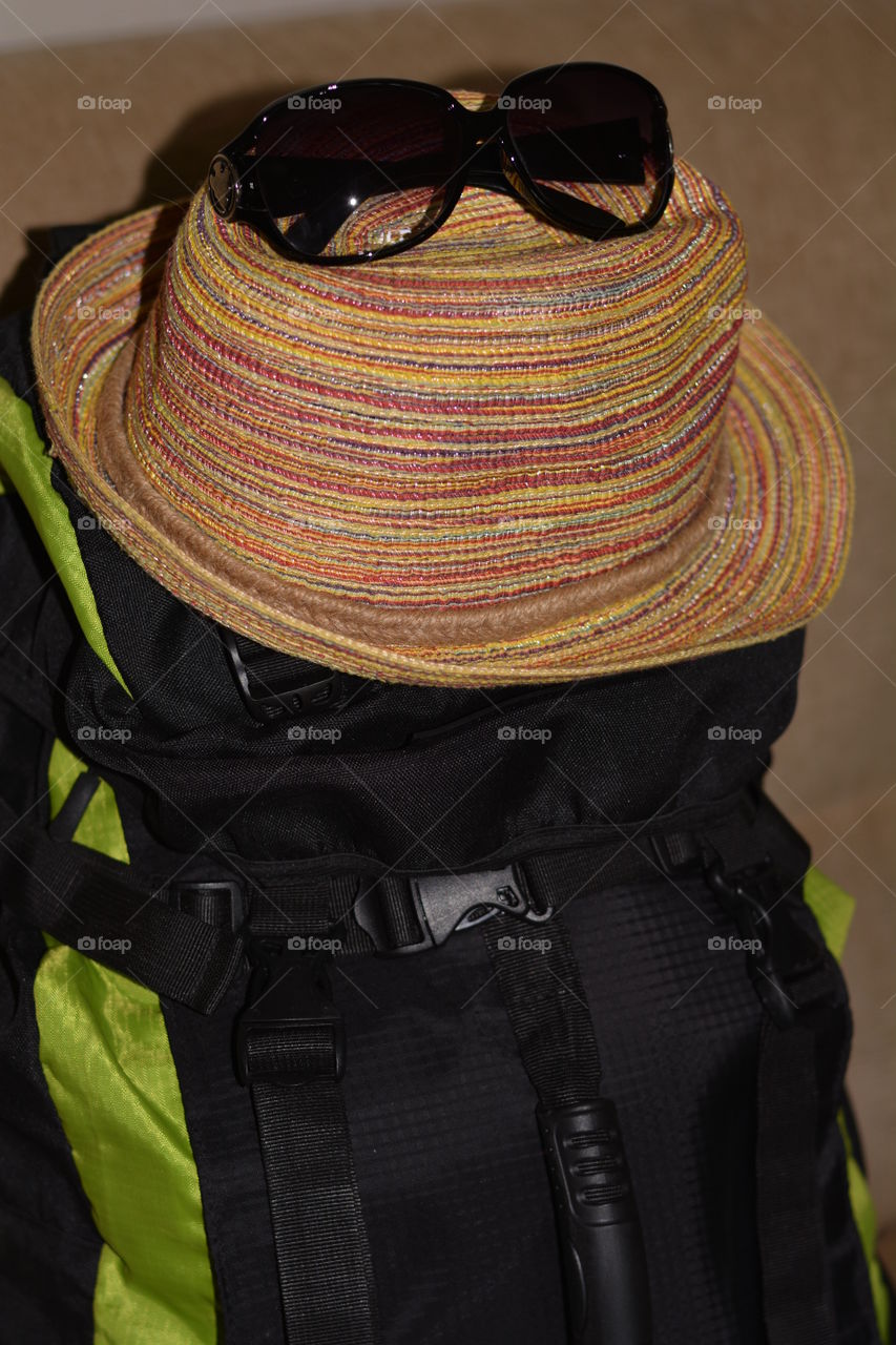 summer travel backpack and objects