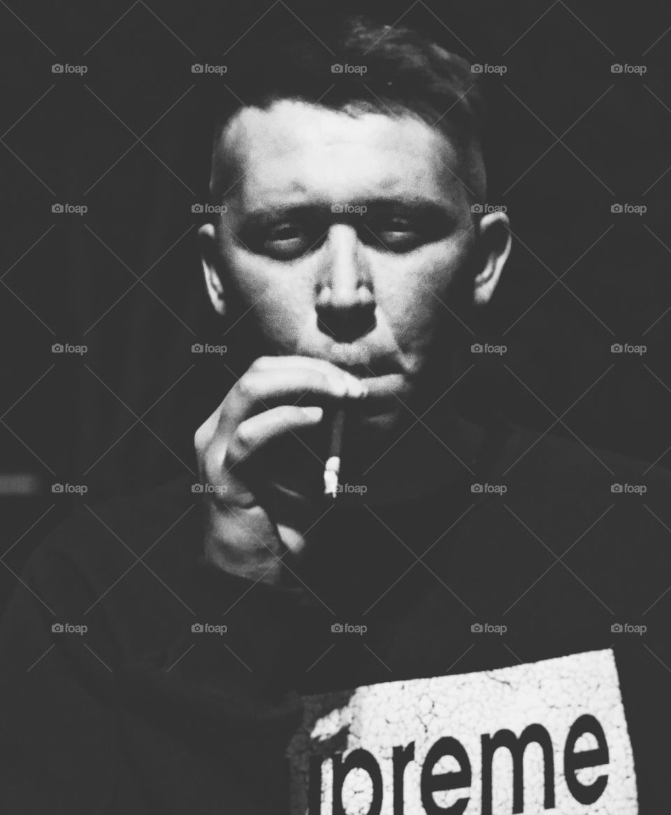 Black and white smoking man portrait