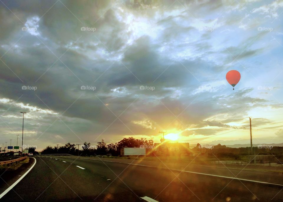 Balloon at sunset