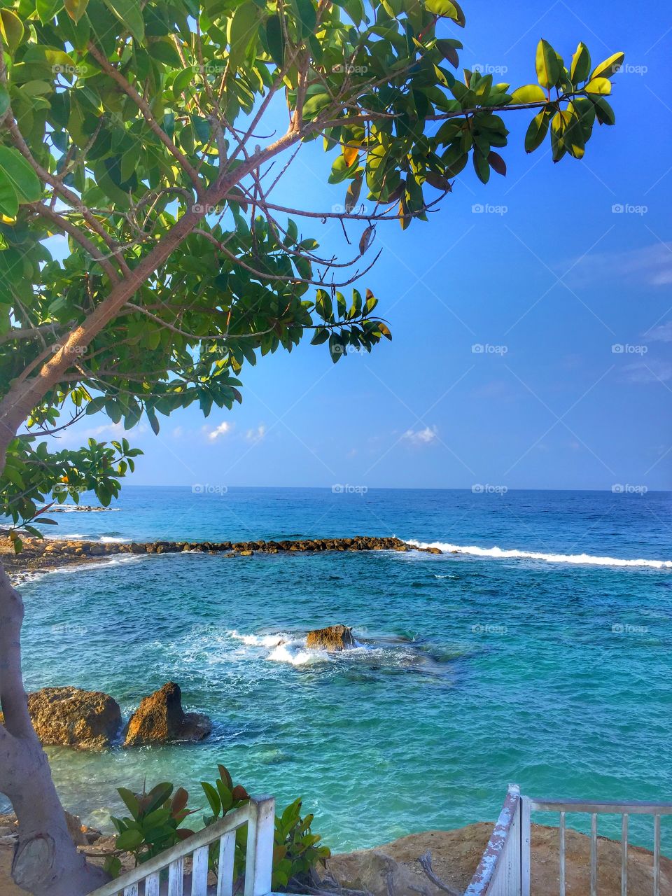Blue skies and sea are such a relaxing thing to watch! Just sitting there, listening to the waves and breathing the fresh air give life!!