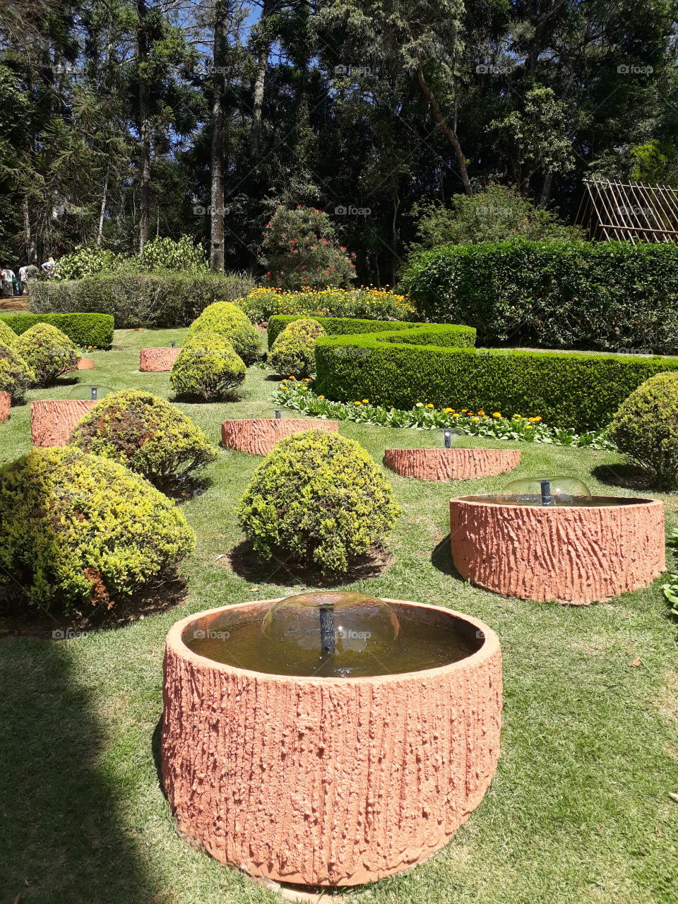 The Bubble Garden is composed of a mosaic of bubbling fountains surrounded by flowers and composition of small bouquets