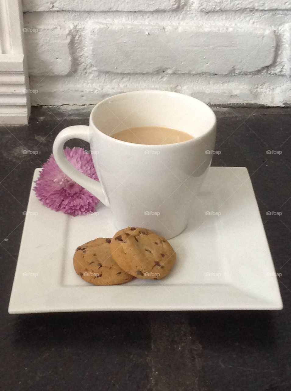 Enjoying a cup of coffee outdoors on a beautiful spring day.