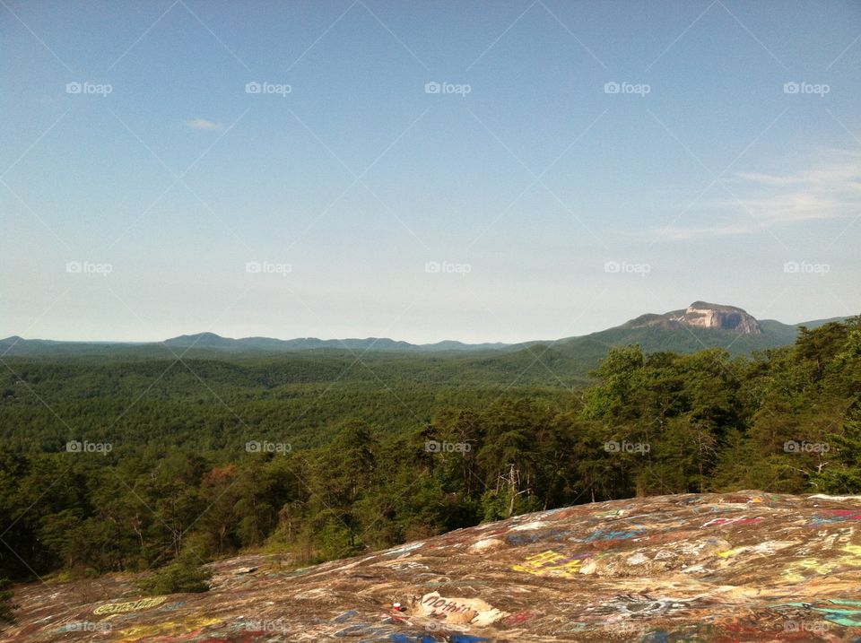 Mountain scene featuring Table Rock in the distance taken from Bald Rock early in the morning.