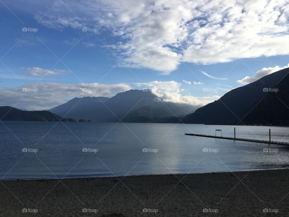 Scenic view of a mountains against cloudy sky