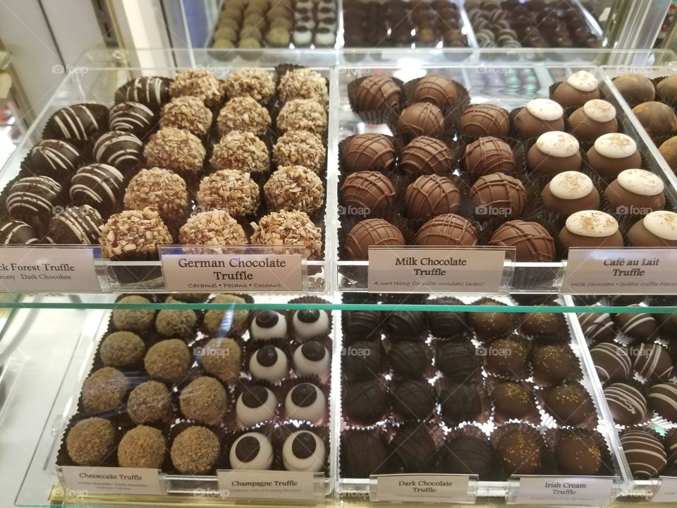 Truffles and bon bons for sale at a specialty candy shop.