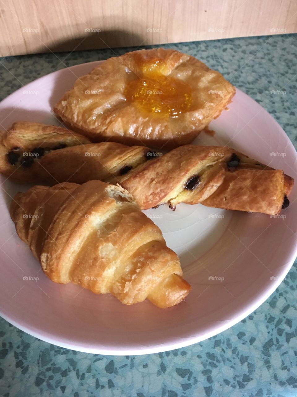 Delicious selection of gluten free continental pastries by marks and Spencer’s - croissant, Belgian chocolate twist and apricot pastry. 