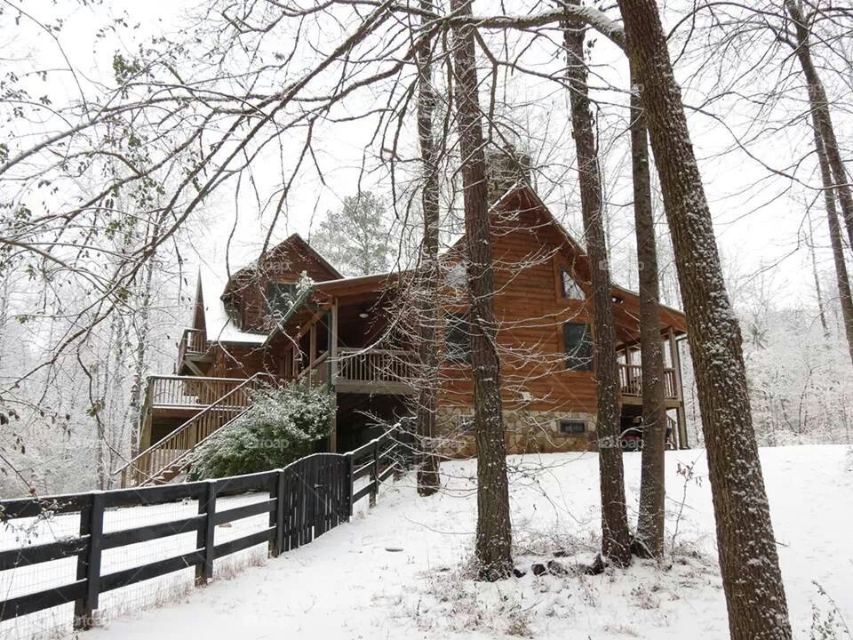 Snow log cabin