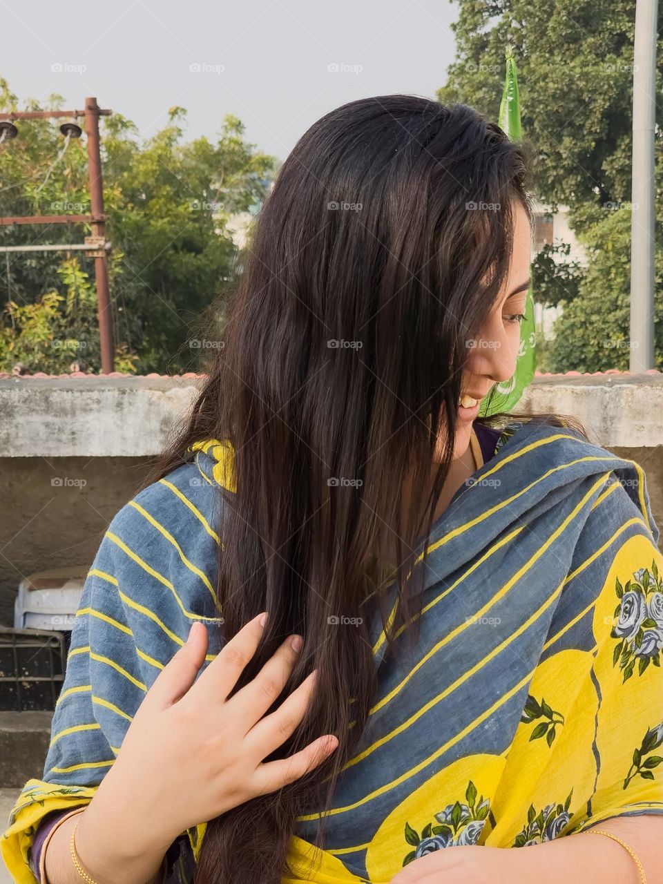 Beautiful long shiny hair with a gorgeous smiling face