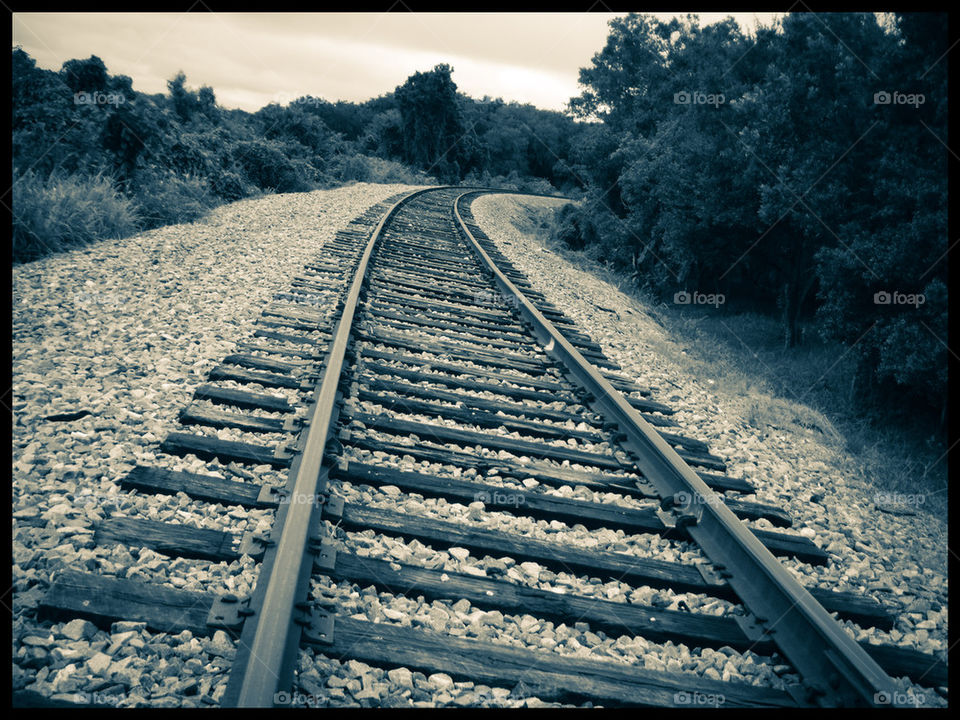 down the railroad tracks