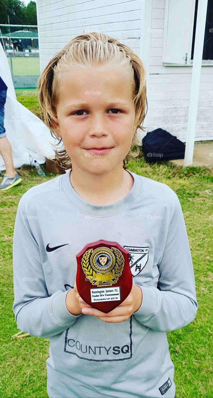 My amazing 10 year old son after finishing runner up in a football / soccer tournament. Goalkeeper who only conceded one goal in 8 games and saved 4 penalties.