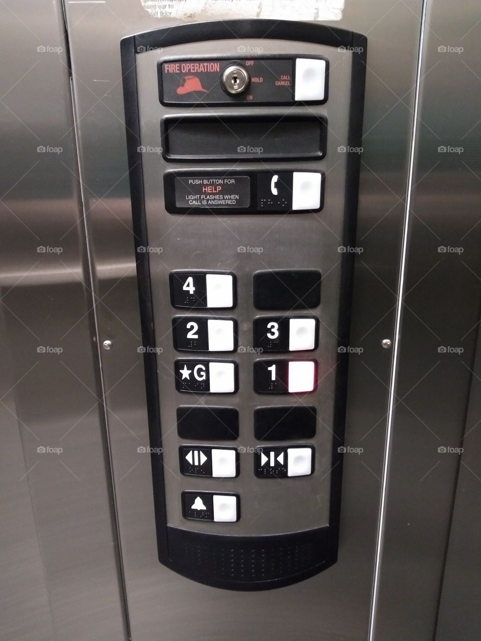 elevator panel. ground through 4th floor.