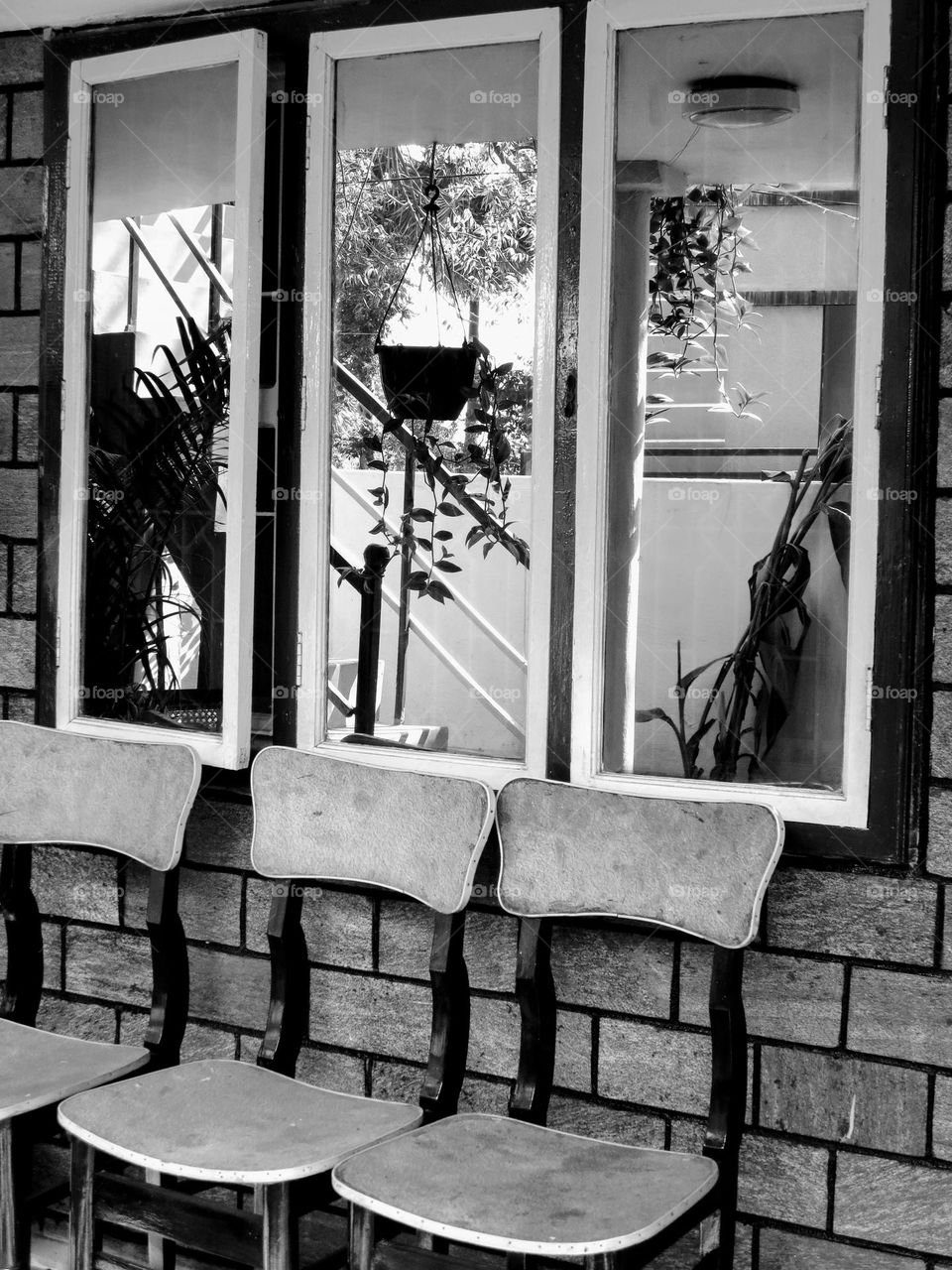 The stone wall n ancient chairs