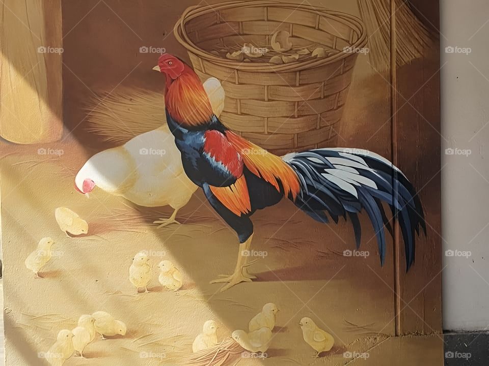 antique chicken and chick drawing on the wall