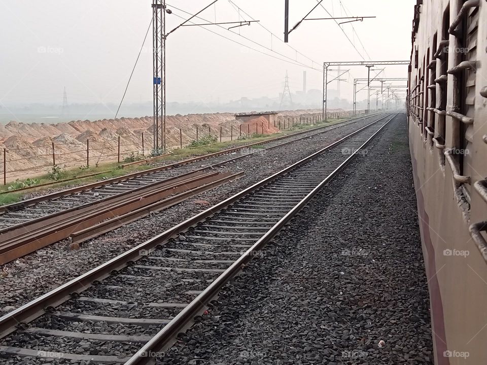 this picture shows the beauty of the railway track in India