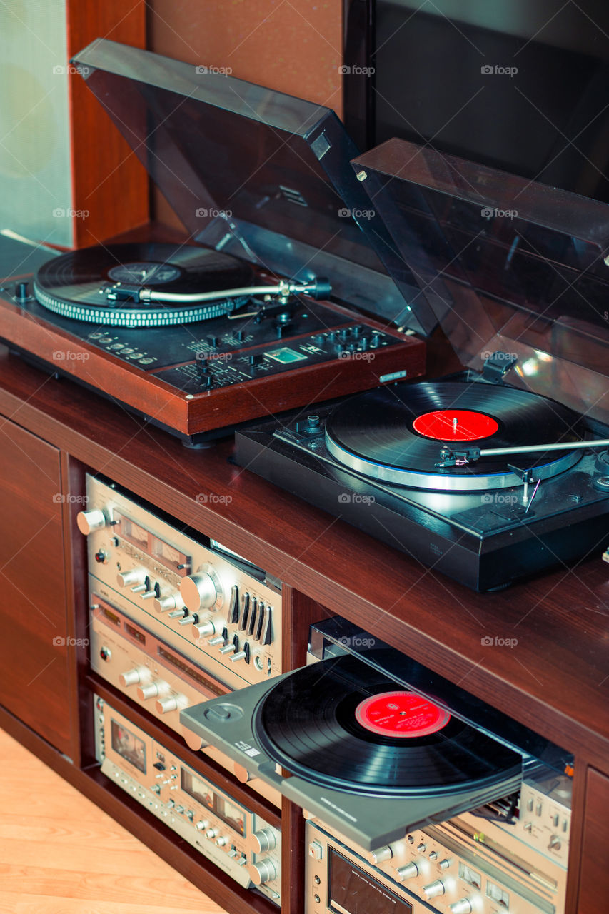 Set of audio equipment, record players, amplifiers, radio and vinyl records