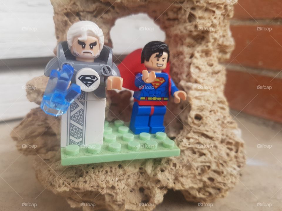 Play with lego. Superman and his dad