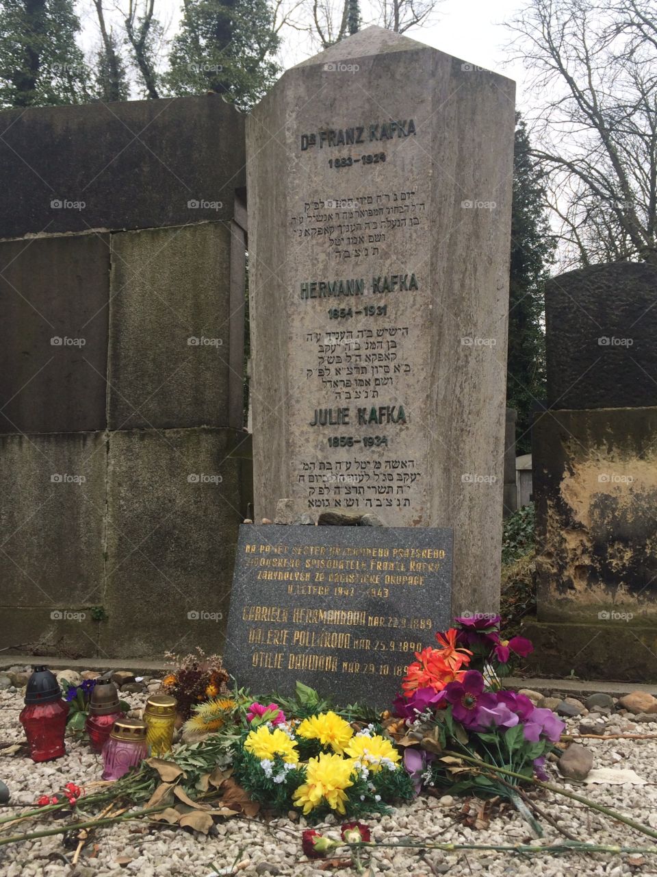 Franz Kafka’s grave site with decorations and flowers 