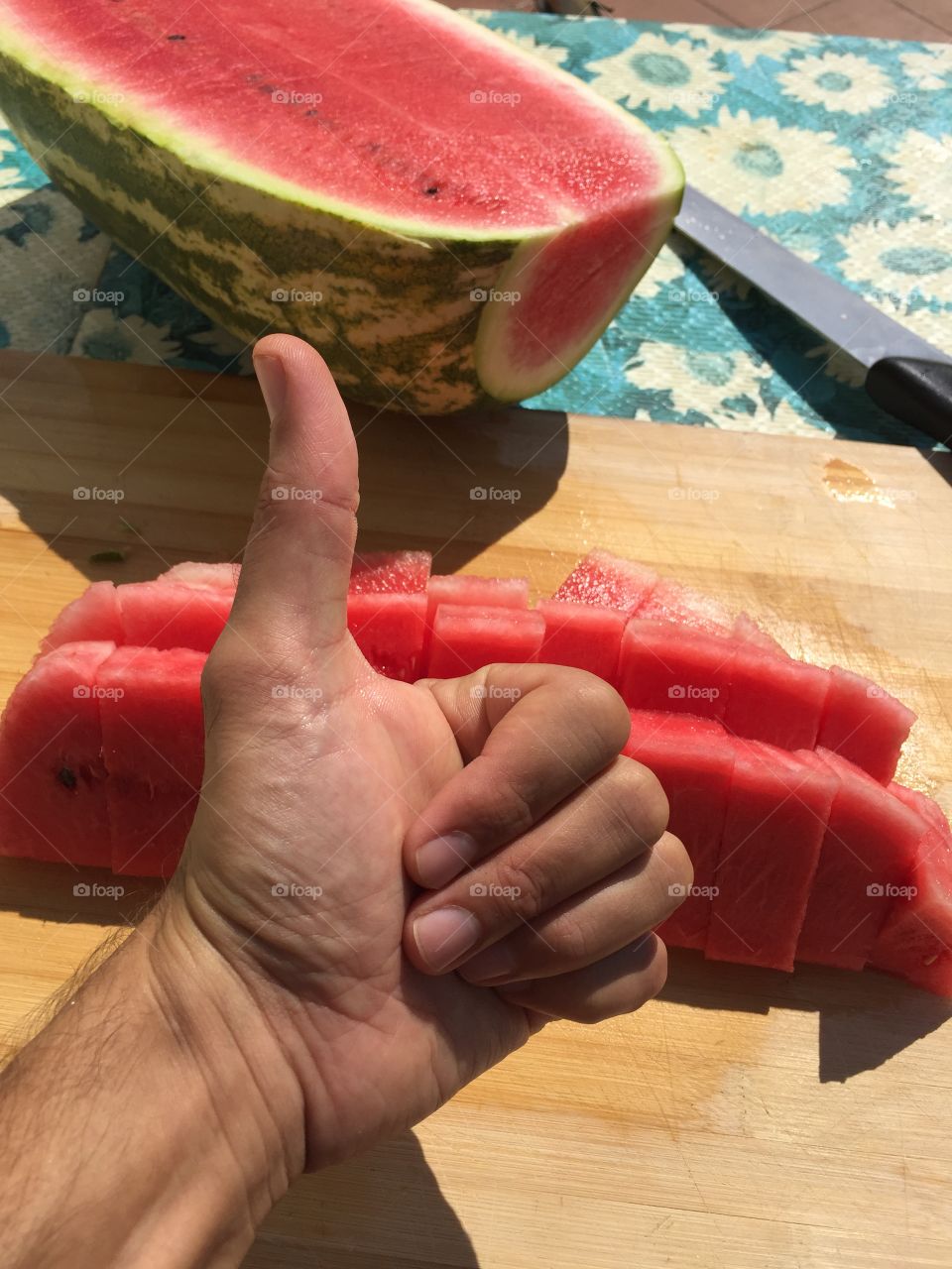 thumb up for the watermelon on summer ready to eat