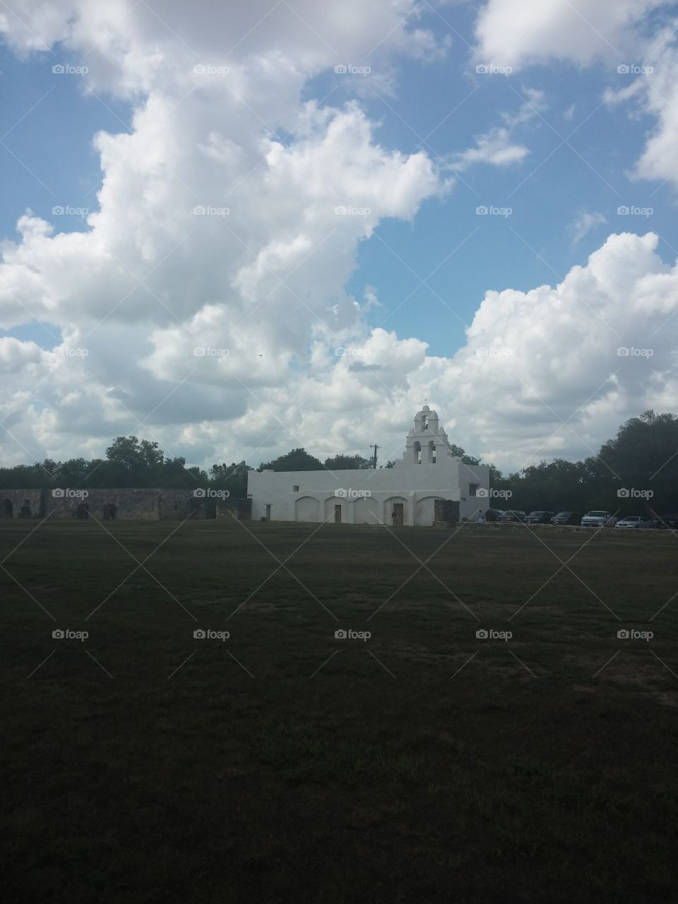 mission church clouds. San Antonio missions