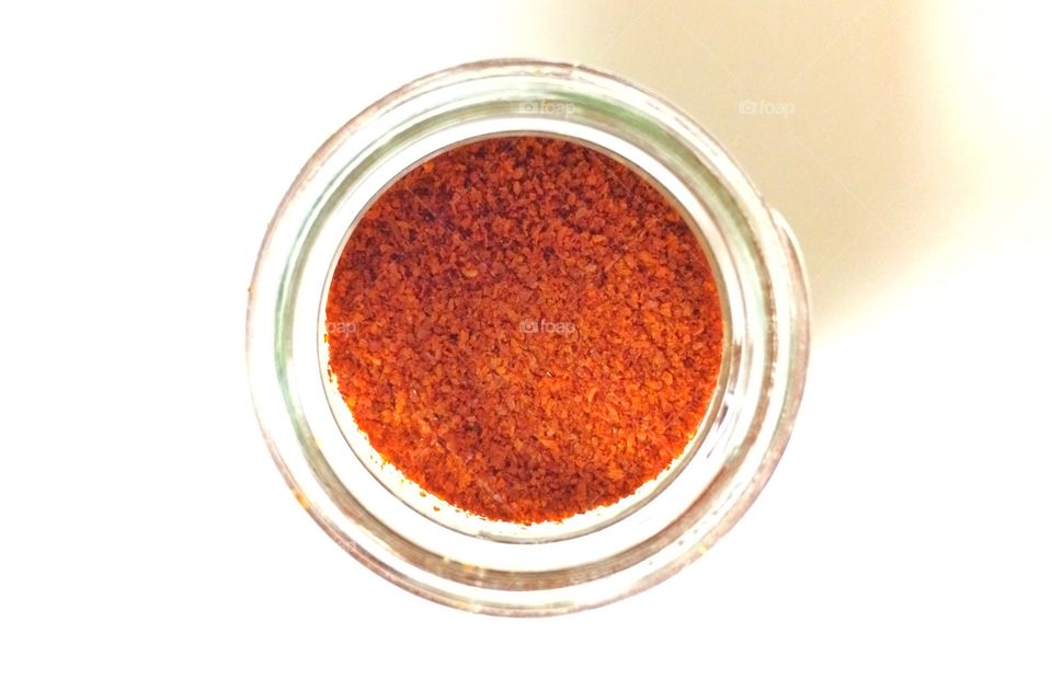 Red chillies powder in container