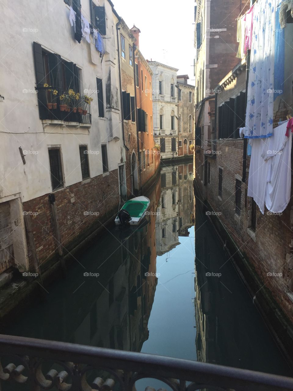 Canal between houses in Venice