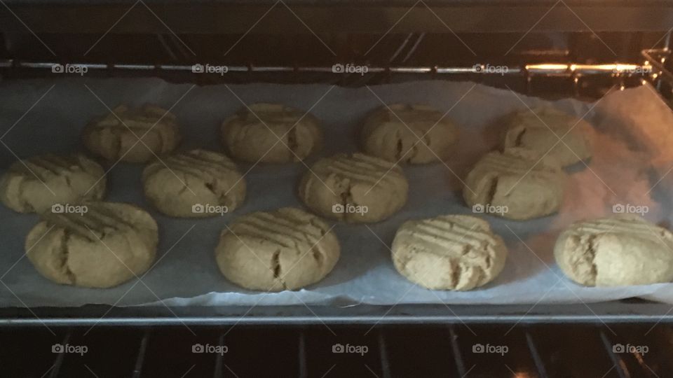 Peanut butter cookies baking in oven