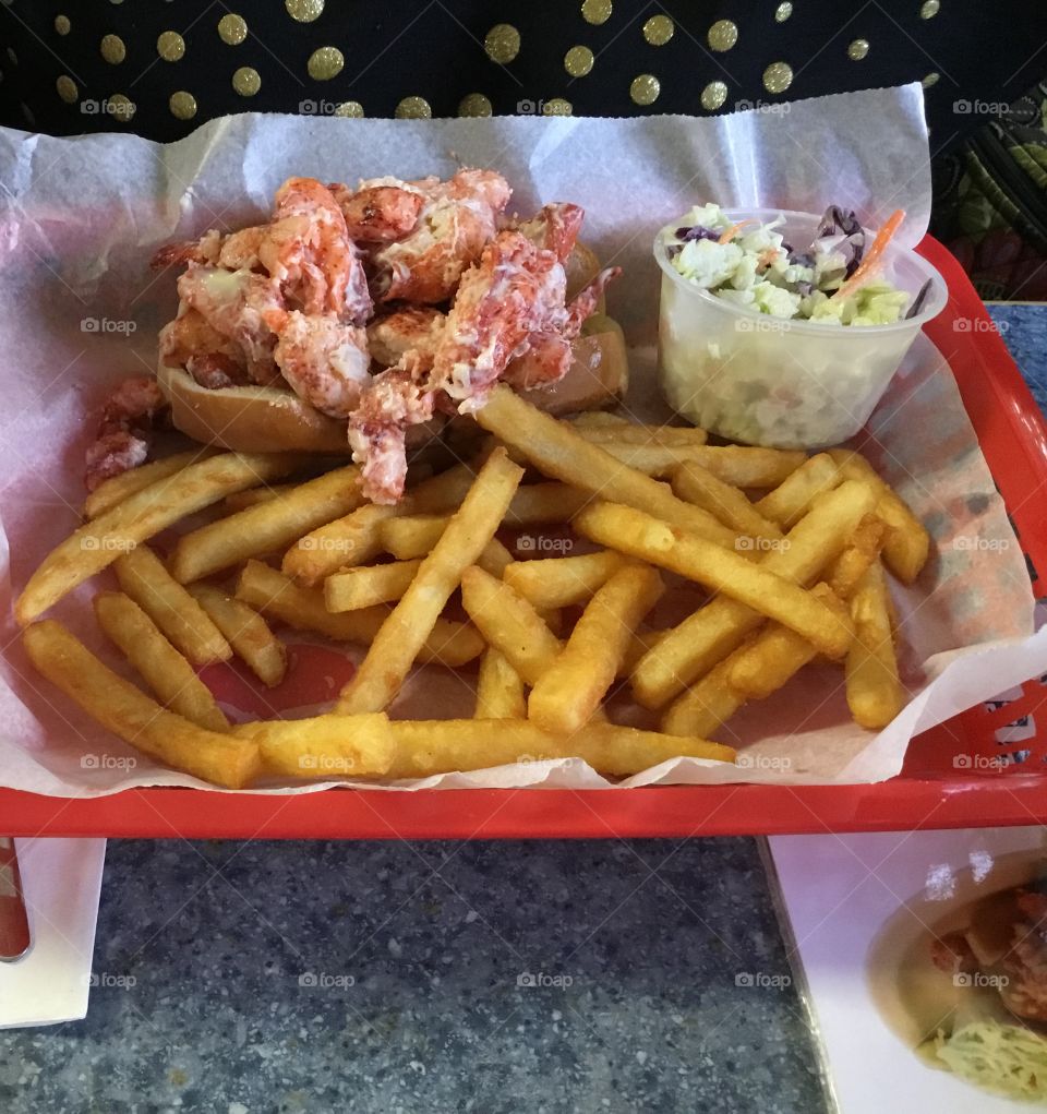 Delicious Lobster Roll, coleslaw and sweet potatoes - Favorite sandwich