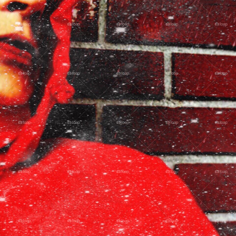 Lady in red in snowfall