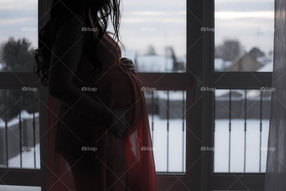 Pregnant women on a balcony