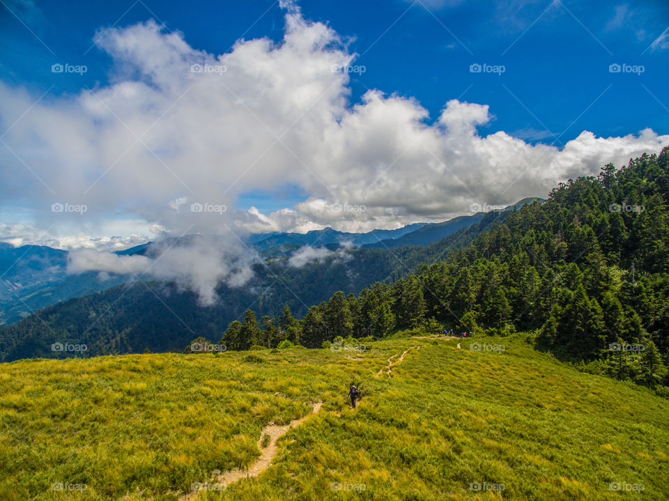 Mountain landscapes and mountain climber