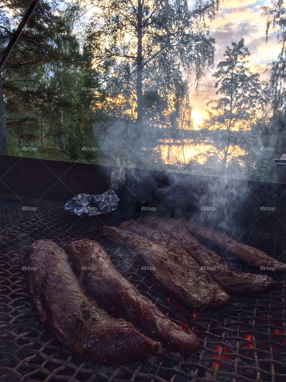 Close-up of meat on barbecue grill