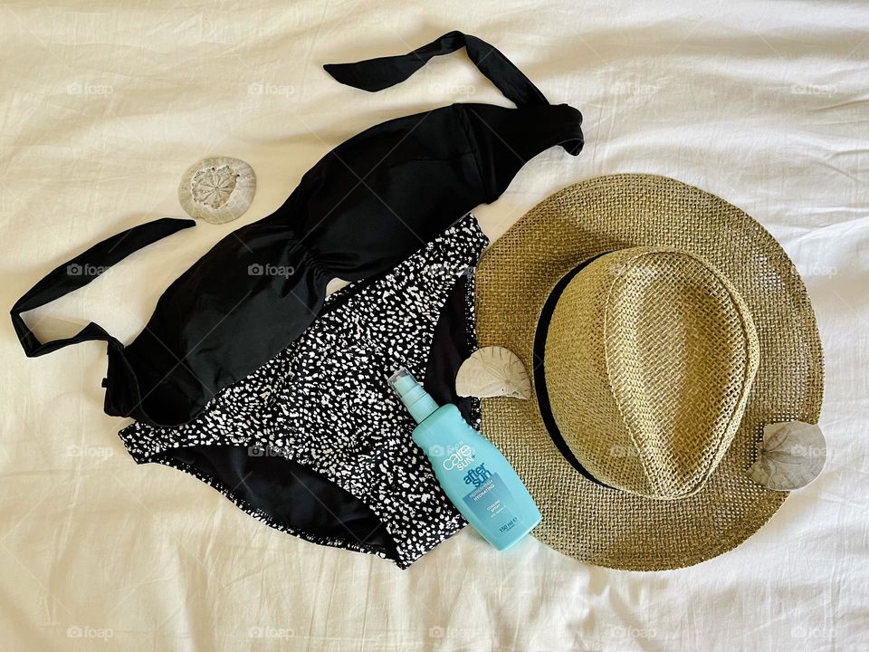 Avon after sun spray with swimming suit and straw hat 