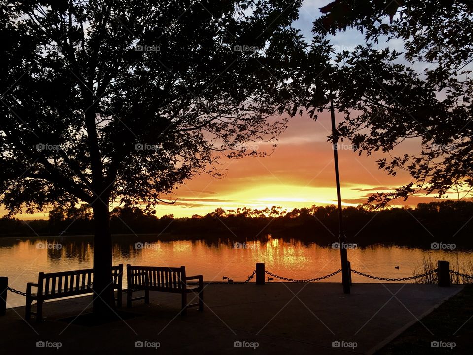 Beautiful orange sunrise over the lake