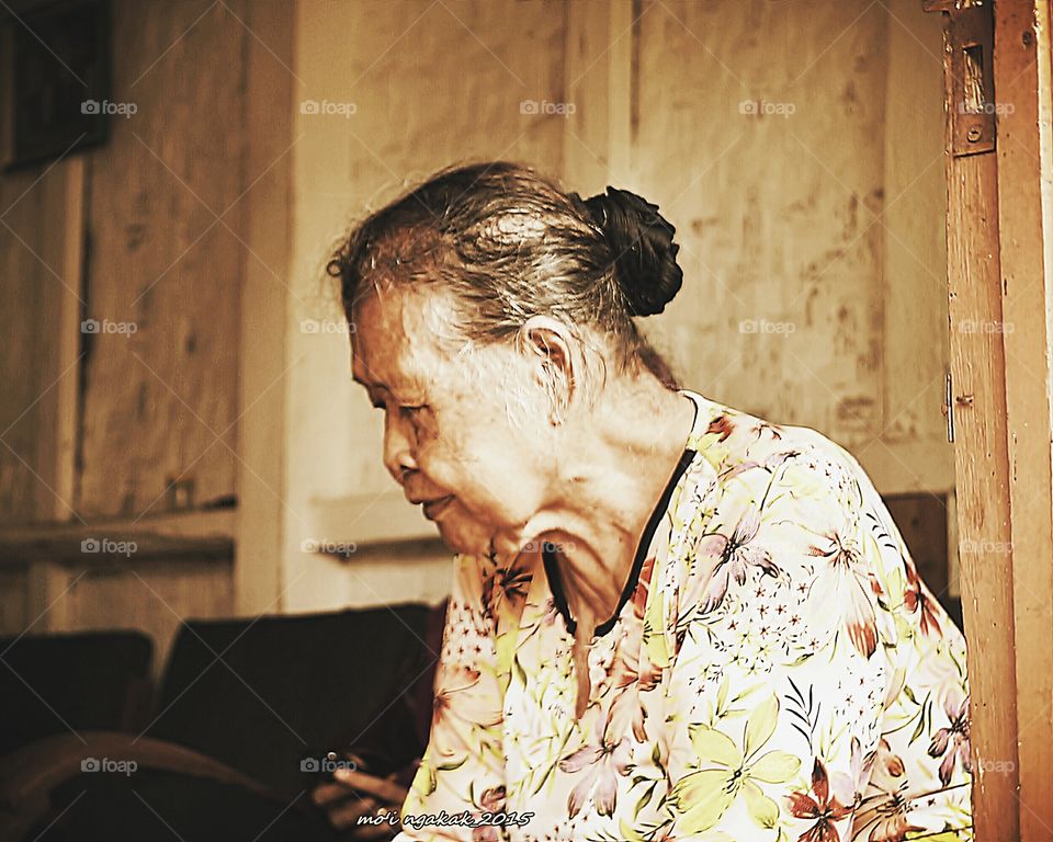 Senior woman sitting on chair